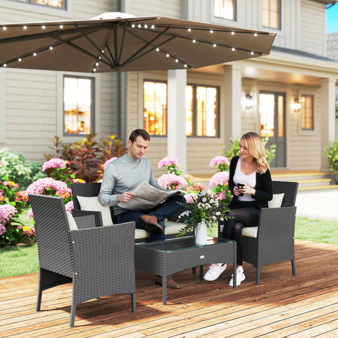 Conjunto de Jardim de Vime Sintético Conjunto de 4 Peças Móveis de Jardim com 2 Poltronas 1 Sofá de 2 Lugares 1 Mesa de Centro com Tampo de Vidro e Almofadas Preto e Branco