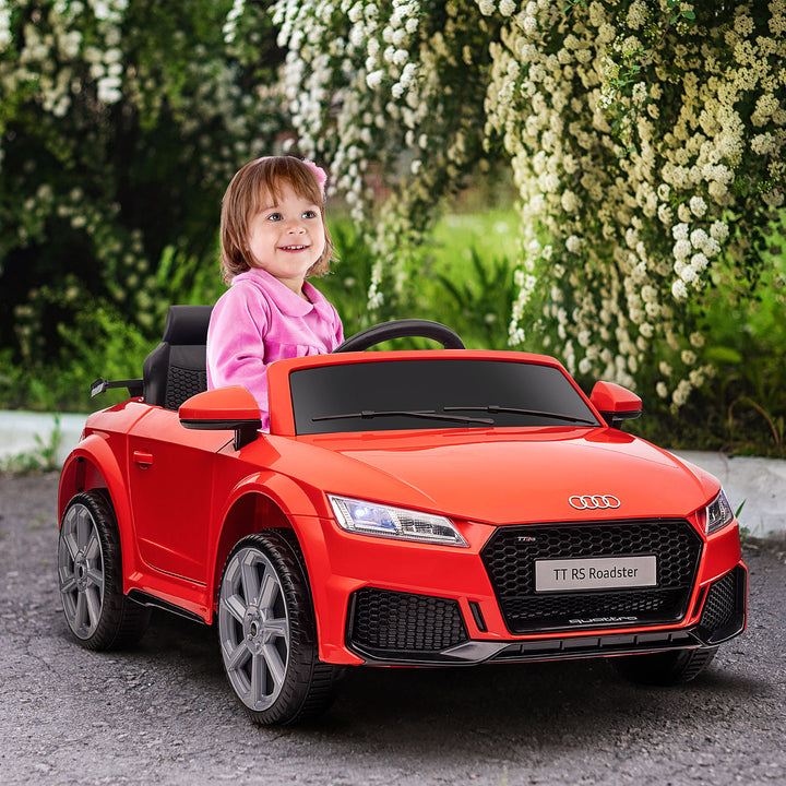 Carro elétrico infantil Audi TT RS acima de 3 anos Bateria 6V Carga 30 kg Vermelho 103x63x44cm