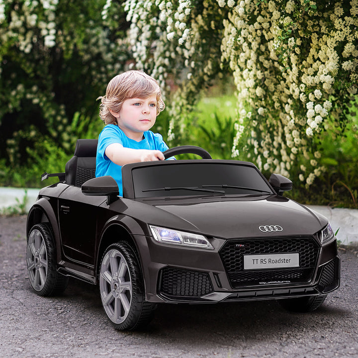 Audi TT elétrico infantil para crianças acima de 3 anos com controle remoto música luzes bateria 6V carga 30 kg 103x63x44cm Preto