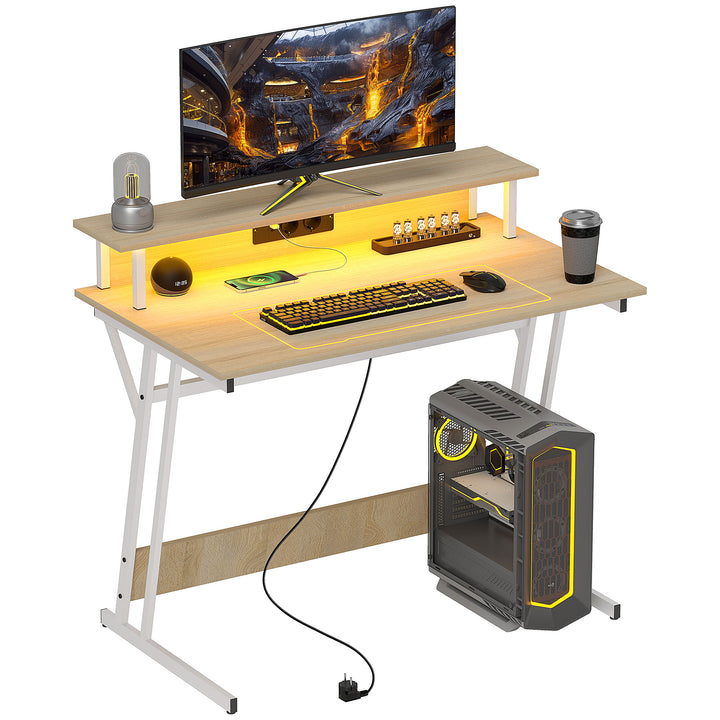 Secretária Gaming com Luzes LED 100x60x88,5 cm Mesa Gaming com Tomadas de Corrente Suporte para Monitor Prateleiras e Controlo Remoto para Escritório Estúdio Madeira