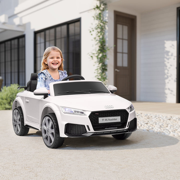 Carro elétrico infantil Audi TT RS acima de 3 anos com controle remoto com música e luzes Bateria 6V 30 kg 103x63x44cm