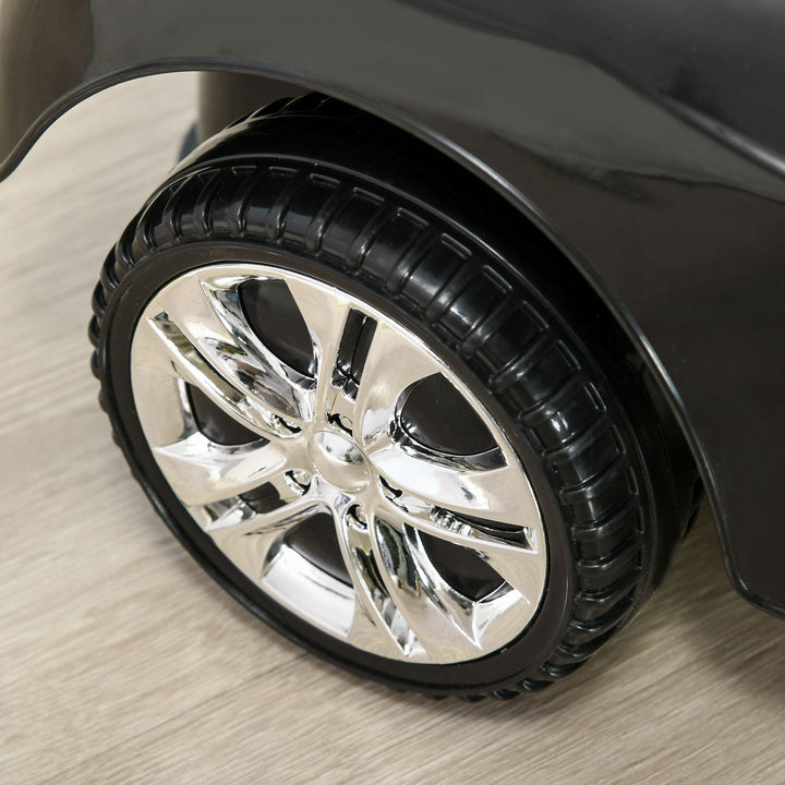 Carro Andador para Crianças de 18-36 Meses com Faróis Música Buzina Volante Compartimento de Armazenamento e Alça para Empurrar 63,5x28x36 cm Preto