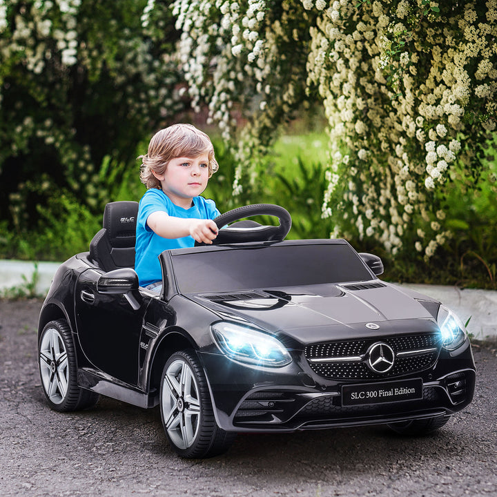 Carro Elétrico Mercedes SLC 300 12V para Crianças de 3-6 Anos com Controlo Remoto Faróis LED Buzina Música TF USB e Abertura da Porta 3-5km/h 107x62,5x44 cm Preto