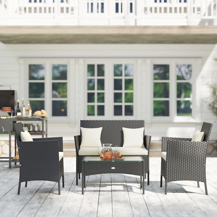 Conjunto de Jardim de Vime Sintético Conjunto de 4 Peças Móveis de Jardim com 2 Poltronas 1 Sofá de 2 Lugares 1 Mesa de Centro com Tampo de Vidro e Almofadas Preto e Branco