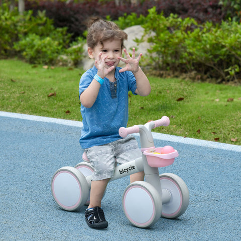 Bicicleta sem Pedais para Crianças de 12-36 Meses Bicicleta de Equilíbrio com Assento Ajustável Cesta e 4 Rodas Silenciosas Carga 20 kg 56x27x39 cm Rosa