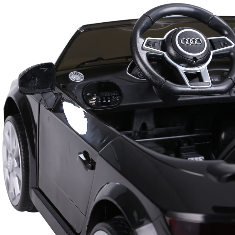 Audi TT elétrico infantil para crianças acima de 3 anos com controle remoto música luzes bateria 6V carga 30 kg 103x63x44cm Preto