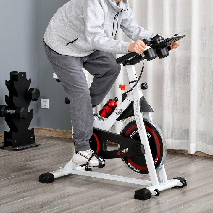 Bicicleta estática Spinning com tela LCD Sela ajustável Volante 8 kg Carga 100 kg 103x53x105-117,5 cm Branco